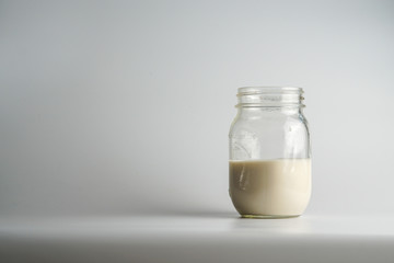 Glass jar of milk