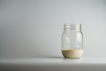 Glass jar of milk