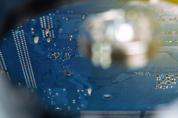 Closeup  inside hard drive  reflect from circuit board