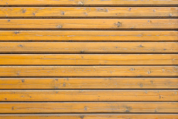 Obraz premium old hammered orange boards background