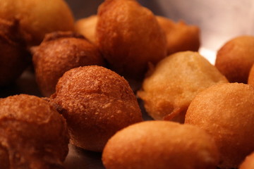 rain cookie - bolinho de chuva fried dough in the shape of balls, tipica do Brasil recipe with cinnamon and sugar
