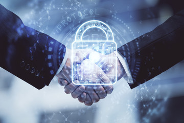 Double exposure of lock hologram and handshake of two men. Partnership security concept.