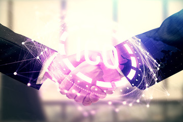 Double exposure of blockchain hologram and handshake of two men. Crypto business concept.