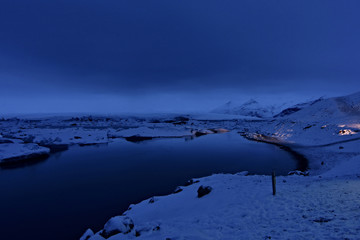 Glacier Lagoon and the mighty Öræfajökull glacier during the winter night. Iceland, Europe. 