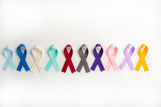 Colorful cancer ribbons as Health symbols for all types of cancer in a row