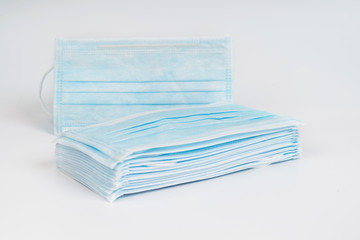 Medical surgical masks isolated on white background. Concept of health care products.Corona Virus.Covid-19