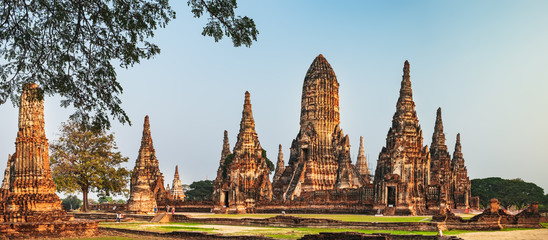 Tourists visit ancient Wat Chai Watthana Ram Temple in old historic district of Ayutthaya, Thailand