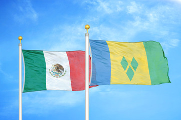 Mexico and Saint Vincent and the Grenadines two flags on flagpoles