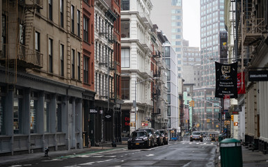 Empty New York City streets without people and closed shops during pandemic coronavirus outbreak in America. 
