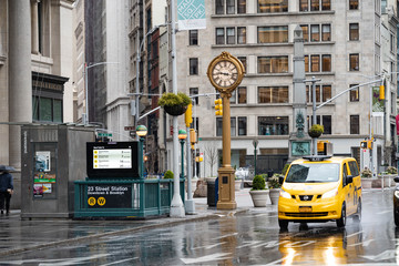 Empty streets of New York City. Madison square garden with historical clock and iron building. Rainy days in new York city, Manhattan. 