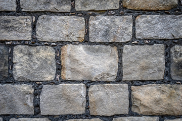 Medieval grey brick wall pattern