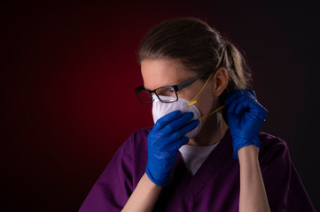 COVID-19 healthcare worker using PPE protective equipment