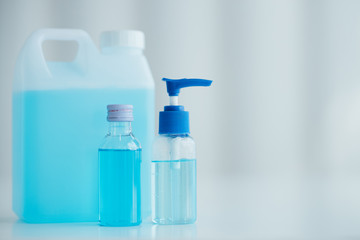 Hand sanitizer alcohol gel rub clean hands hygiene prevention of coronavirus virus outbreak. People using bottle of alcohol gel antibacterial sanitiser.