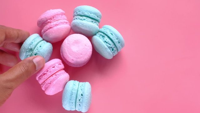  close up of colorful macaroon on color background 