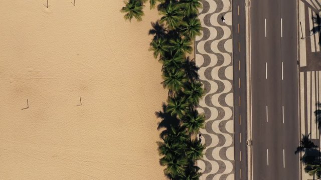 Aerial Of Empty Copacabana Beach And Mosaic Sidewalk During Coronavirus Lockdown
