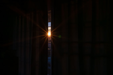 Sunlight pass through curtain gap in the morning