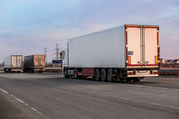 Trucks moving on a suburban highway