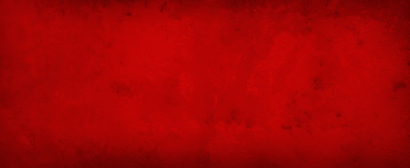 Red background texture in old vintage grunge and paint design in bright red Christmas or valentines day colors, antique solid color paper or metal illustration