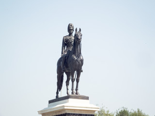 The equestrian statue of King Chulalongkorn (Rama V) Monument  with blue sky.