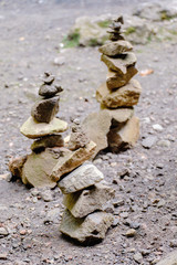 Pile of rock stacked in balance with each other to form a tower, an ancient ritual of good fortune and prosperity.