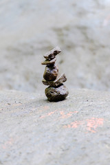 Pile of rock stacked in balance with each other to form a tower, an ancient ritual of good fortune and prosperity.