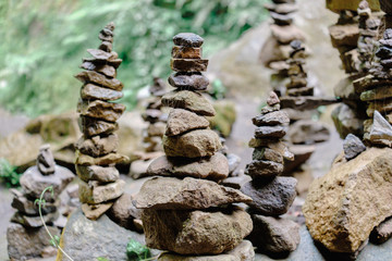 Pile of rock stacked in balance with each other to form a tower, an ancient ritual of good fortune and prosperity.