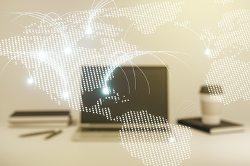 Double exposure of abstract digital world map with connections on laptop background, research and strategy concept