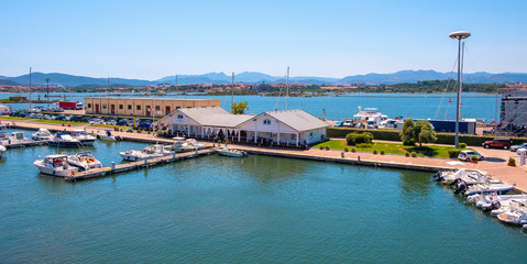 Olbia, Italy - Panoramic view of Olbia port and yacht marina area with piers and Tyrrhenian sea...