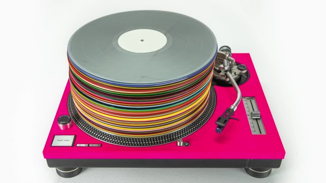 Animation of records stacked on vintage record player.