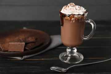 Cup of hot chocolate on table