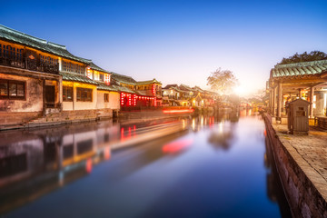 Fototapeta premium Beautiful night view and houses along the river in Xitang ancient town, Zhejiang Province..