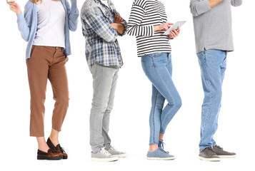 Young people waiting in line on white background