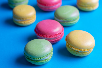Fototapeta na wymiar colorful macarons dessert with vintage pastel tones, close up