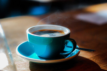 black coffee in a cup at home