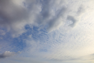 Obraz premium Clouds on a blue sky as a background