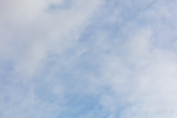 Clouds on a blue sky as a background