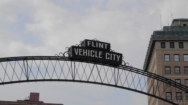 Flint Vehicle City Sign Close Above Street 