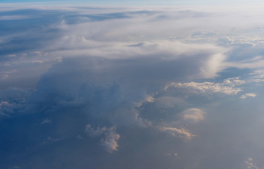 View of the clouds from the plane. View from airplane.
