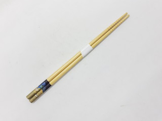Fototapeta premium Japanese Chinese Bamboo Wooden Artistic Chopsticks for Traditional Eatery Tools in White Isolated Background