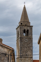 Fototapeta na wymiar Medieval church bell tower in Boljun old village, Istria, Croatia