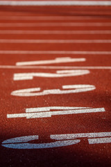 Red running sport track background and texture. Sport running track concept.