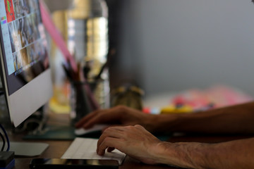 Business man working online at home because of covid-19. Work from home concept. Selective focus.