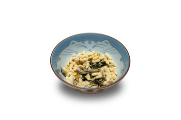 Snacks in a Japanese style bowl with a blue cartoon cat pattern on a white background.