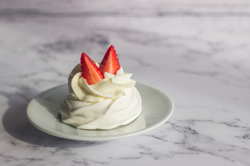 Dessert "Pavlova". Airy crispy meringue, delicate cheese cream and strawberries
