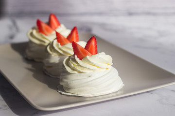 Dessert "Pavlova". Airy crispy meringue, delicate cheese cream and strawberries