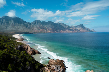 Fototapeta na wymiar The South African coastline from Gordon's Bay to RooiEls, beautiful mountains drop into the ocean