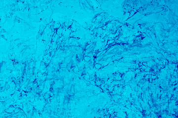 Abstract vintage retro wall toned in blue.