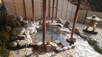 It is a picture of Hot spring in Hakone, Japan. It's called Onsen.