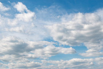 blue sky with white clouds as background