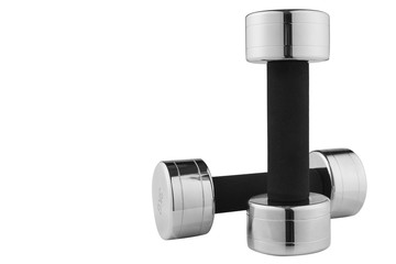a pair of large steel chrome dumbbells with neoprene pads on the handles, one is standing, the other is lying, on a white background